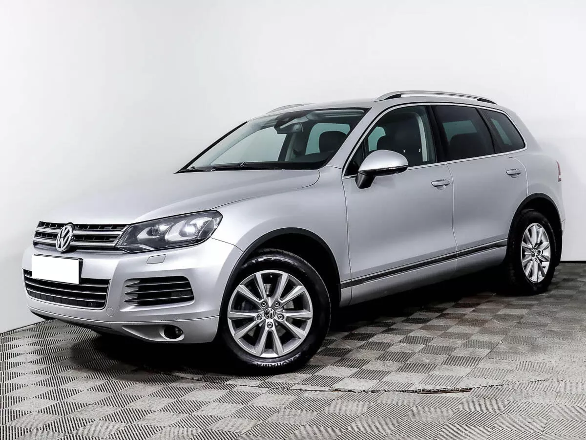 Туарег 2014 года. Туарег 14 года. Volkswagen Touareg 2014 серебристый. Туарег 2014 года Фора.